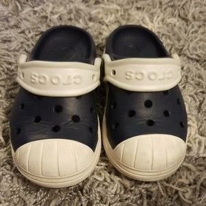 Blue and white Crocs